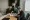 Business professionals reviewing documents in a meeting.